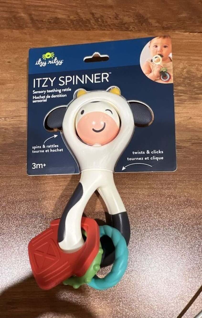 Itzy Ritzy Itzy Spinner Sensory Teething Rattle - Cow